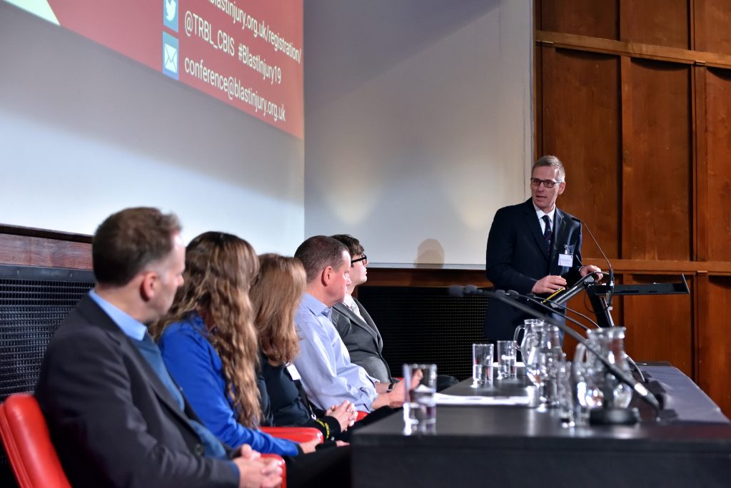 Professor Anthony Bull asking the panel questions in session 1.