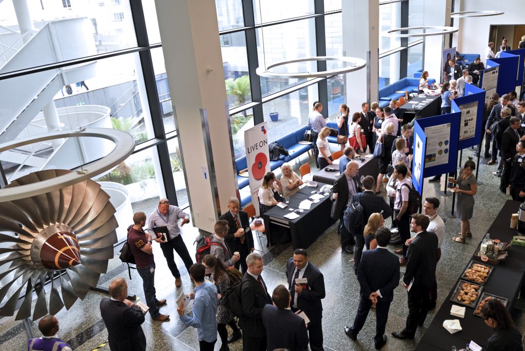 Delegates gather for networking, and viewing of the research posters.