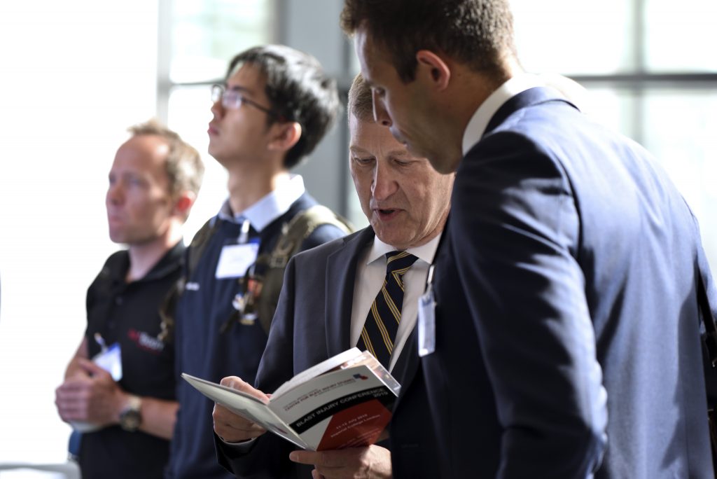 Two of our session chairs discuss the programme for the day.